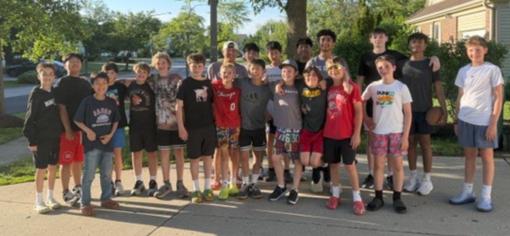 OG Elite players together at an outdoor court